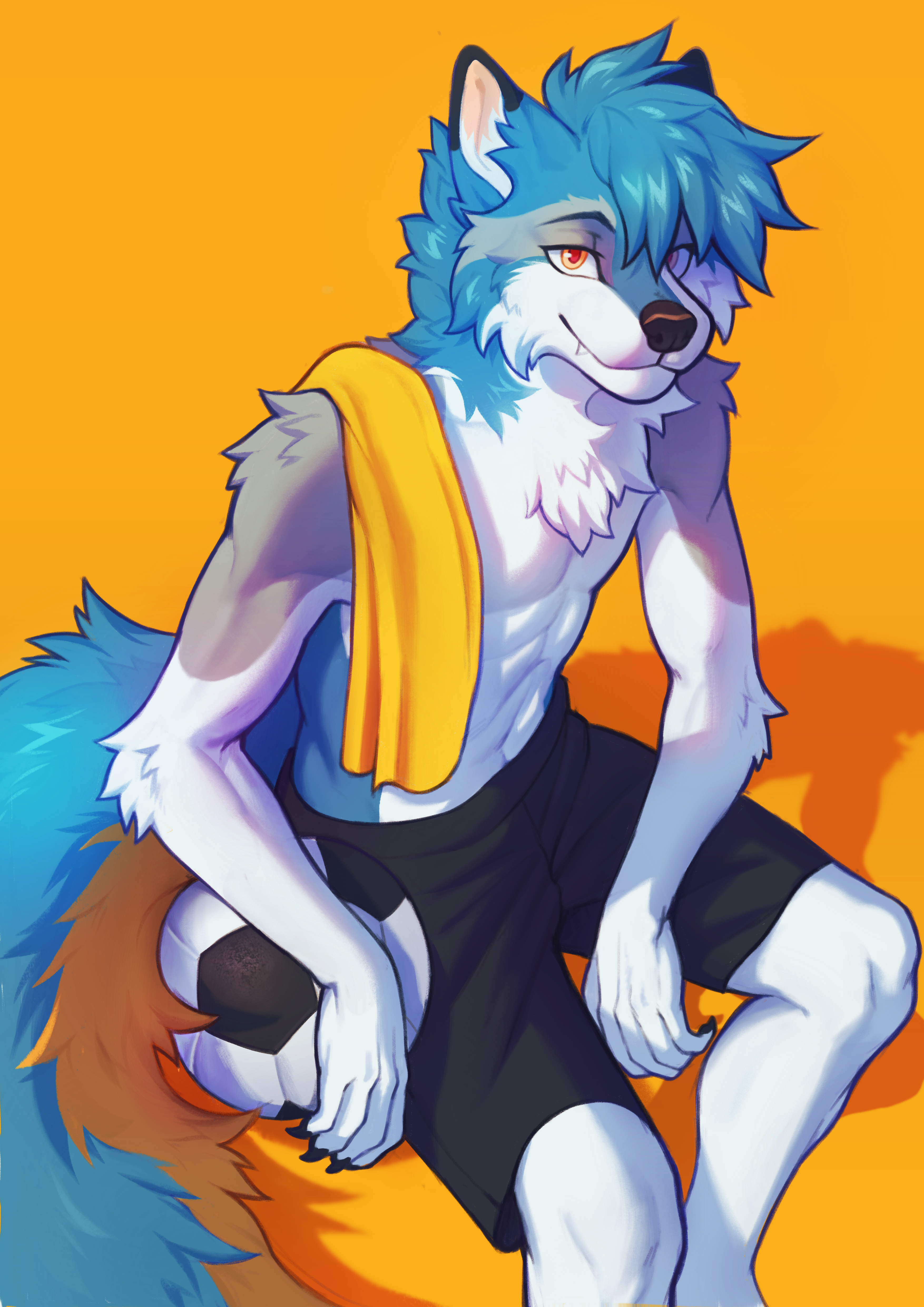 Zeni seated with a soccer ball, wearing dark shorts and a yellow towel over one shoulder